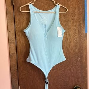 Henley body suit with build in bra